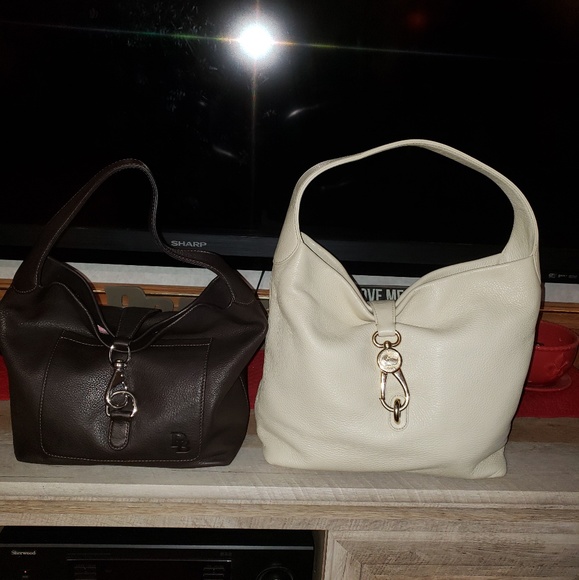 Sold...Dooney and Bourke small lock - Picture 4 of 4